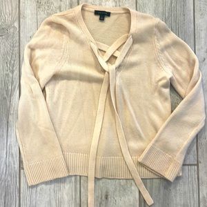 Ann Taylor cream sweater with cute criss cross tie in front.
